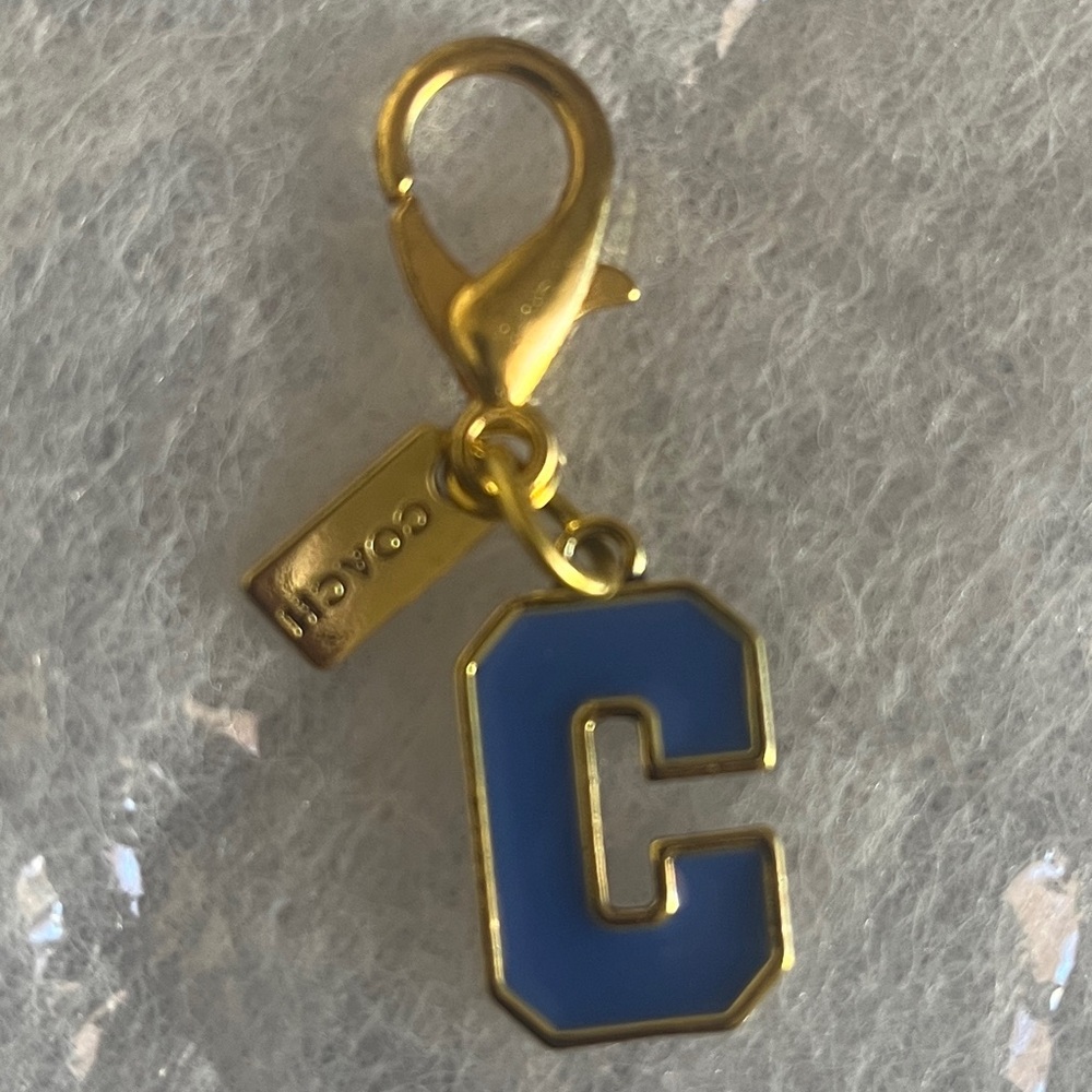 Gold Toned And Blue Signature C Bag Charm With Small Tag